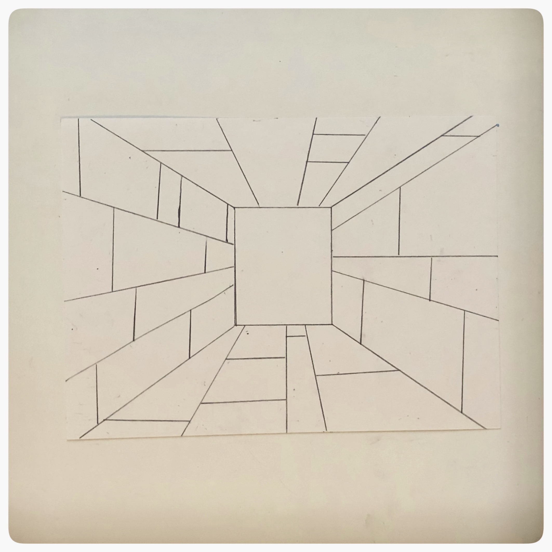 Using your ruler, begin making Vertical Lines.  This looks a little like a hallway turned into Mondrian’s Composition of Red, Blue, Yellow with his abstract squares. 
You may also turn your center rectangle into one of Mondrian’s compositions.  
