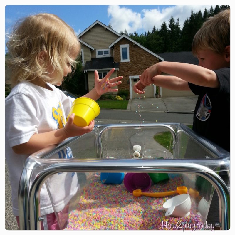 Rice is a fantastic (and gluten free) sensory play item.  It's also very simple to color and if kept in the correct container, will keep for years.  