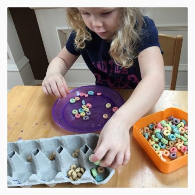 Counting food pieces builds fine motor skills and makes for a fun snack time