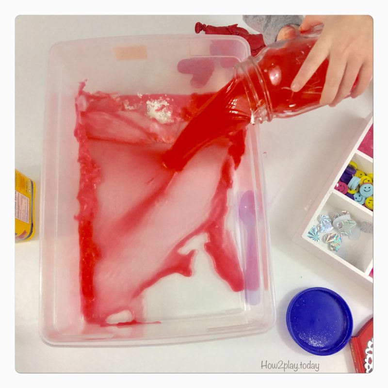 Valentine's Goop Sensory play. This goop or oobleck is super simple to make with water and cornstarch. Add some food coloring and little toys of your choice and you have a great invitation to play for sensory/ science time.