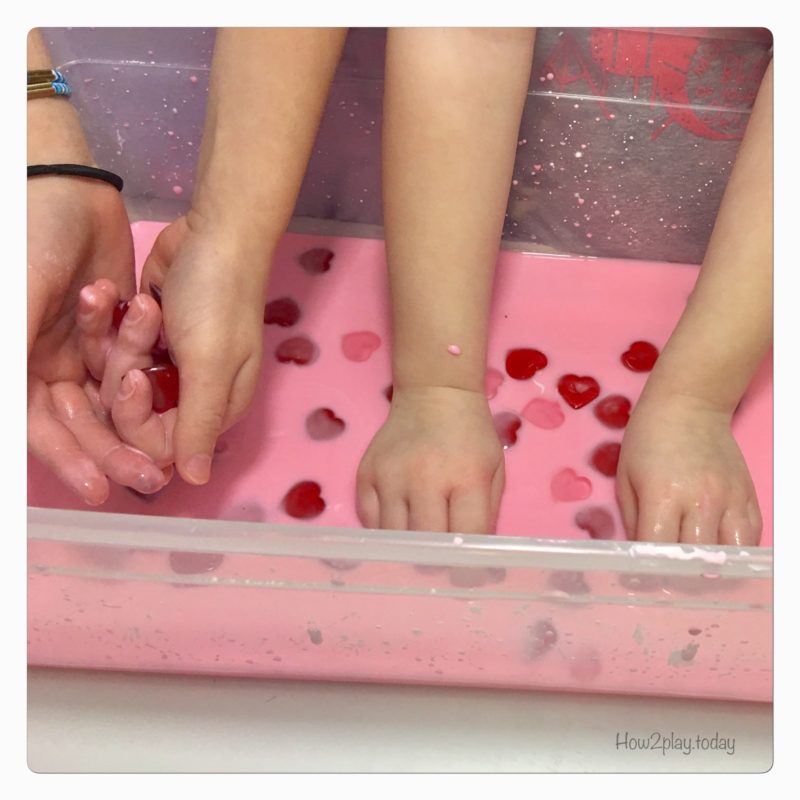 Valentine's Goop Sensory play. This goop or oobleck is super simple to make with water and cornstarch. Add some food coloring and little toys of your choice and you have a great invitation to play for sensory/ science time.