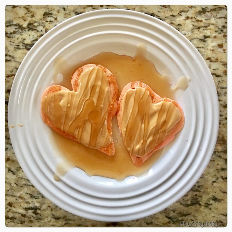 Valentine snacks are easy to make and add some fun to your loved ones. A little food coloring and a squeeze bottles makes your morning pancakes into a sweet dish.