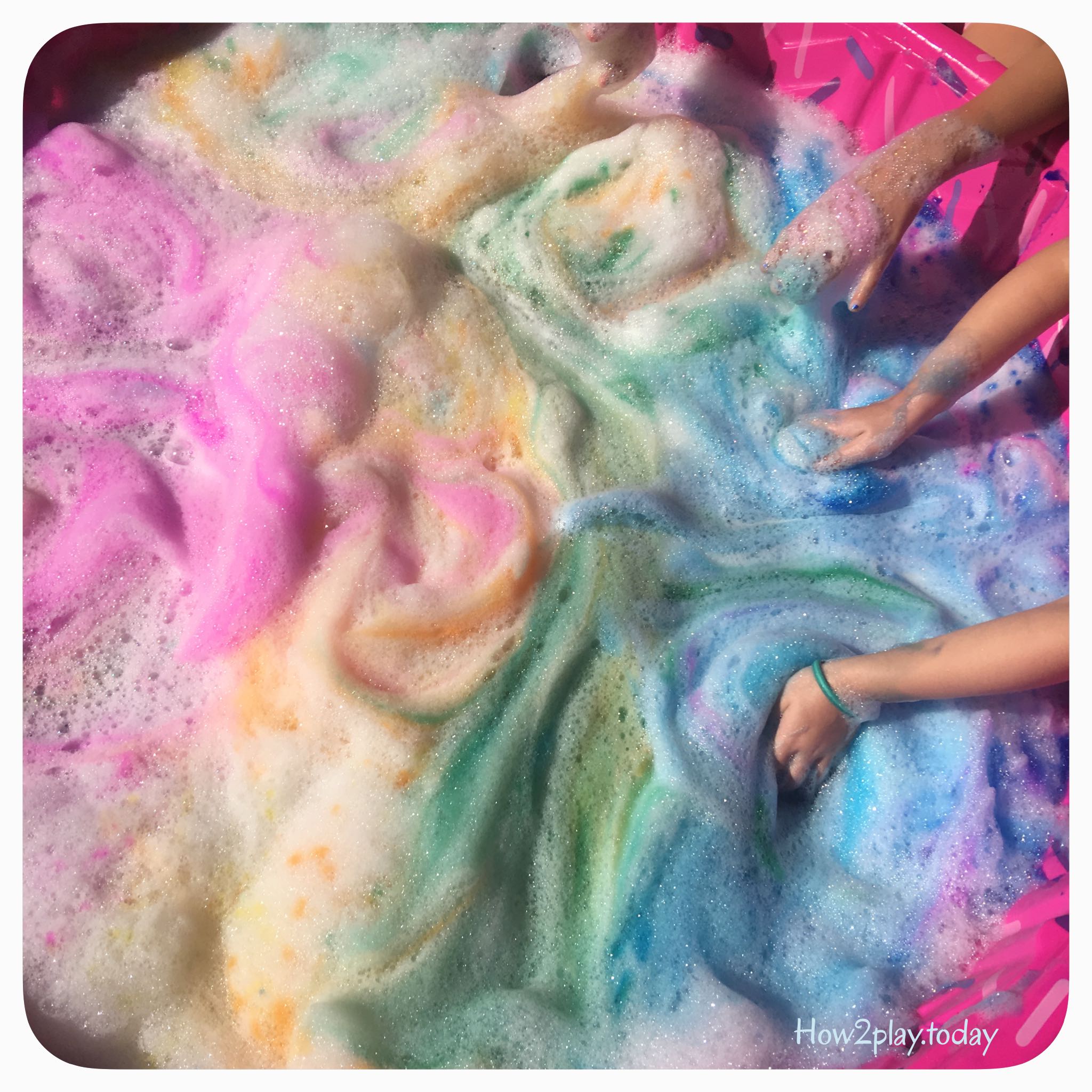 Creating simple sensory activities for kids to enjoy while exploring colors and bubbles.