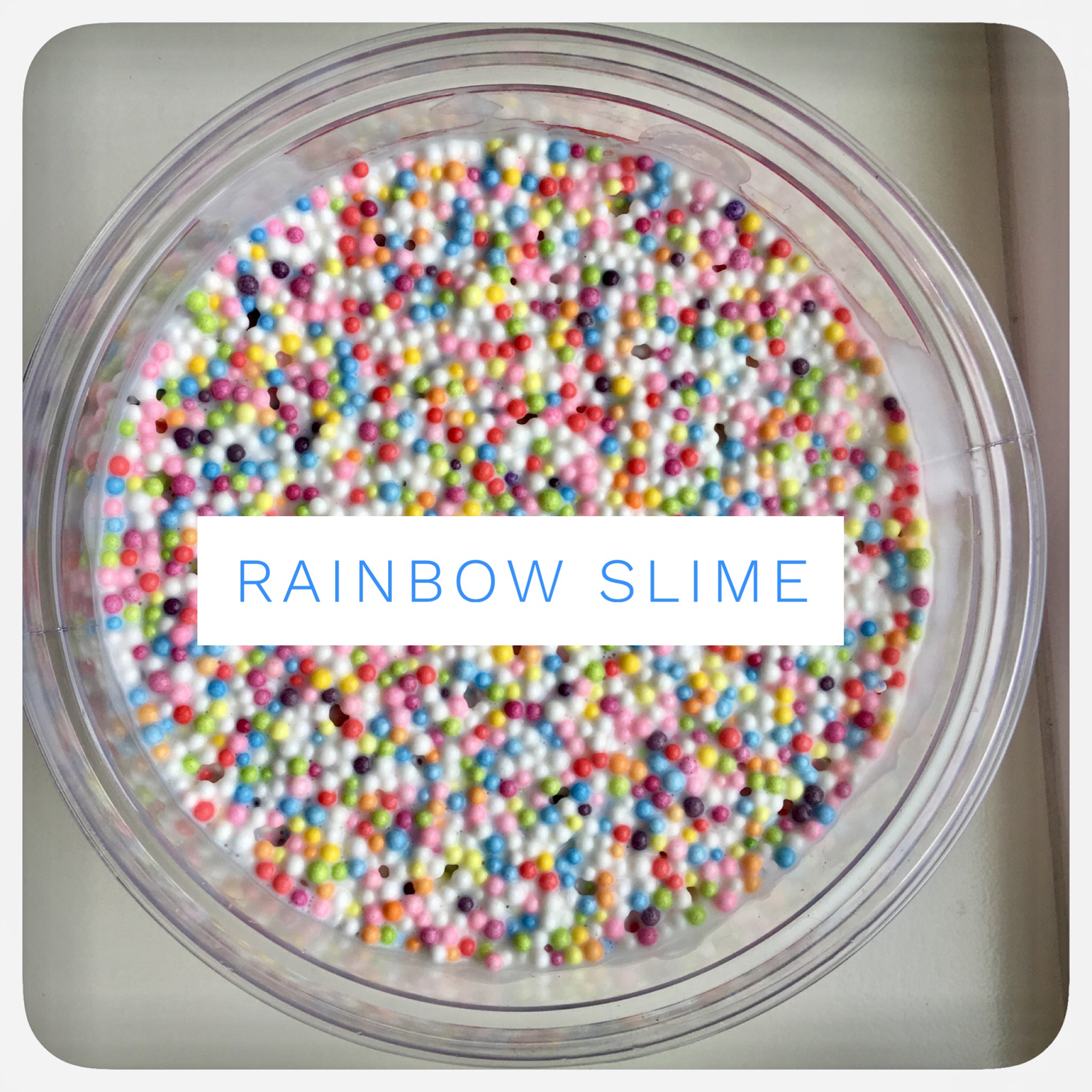 Creating simple sensory activities for kids to explore using slime. We made this with small, rainbow colored styrofoam balls purchased from Amazon. (size 0.18)