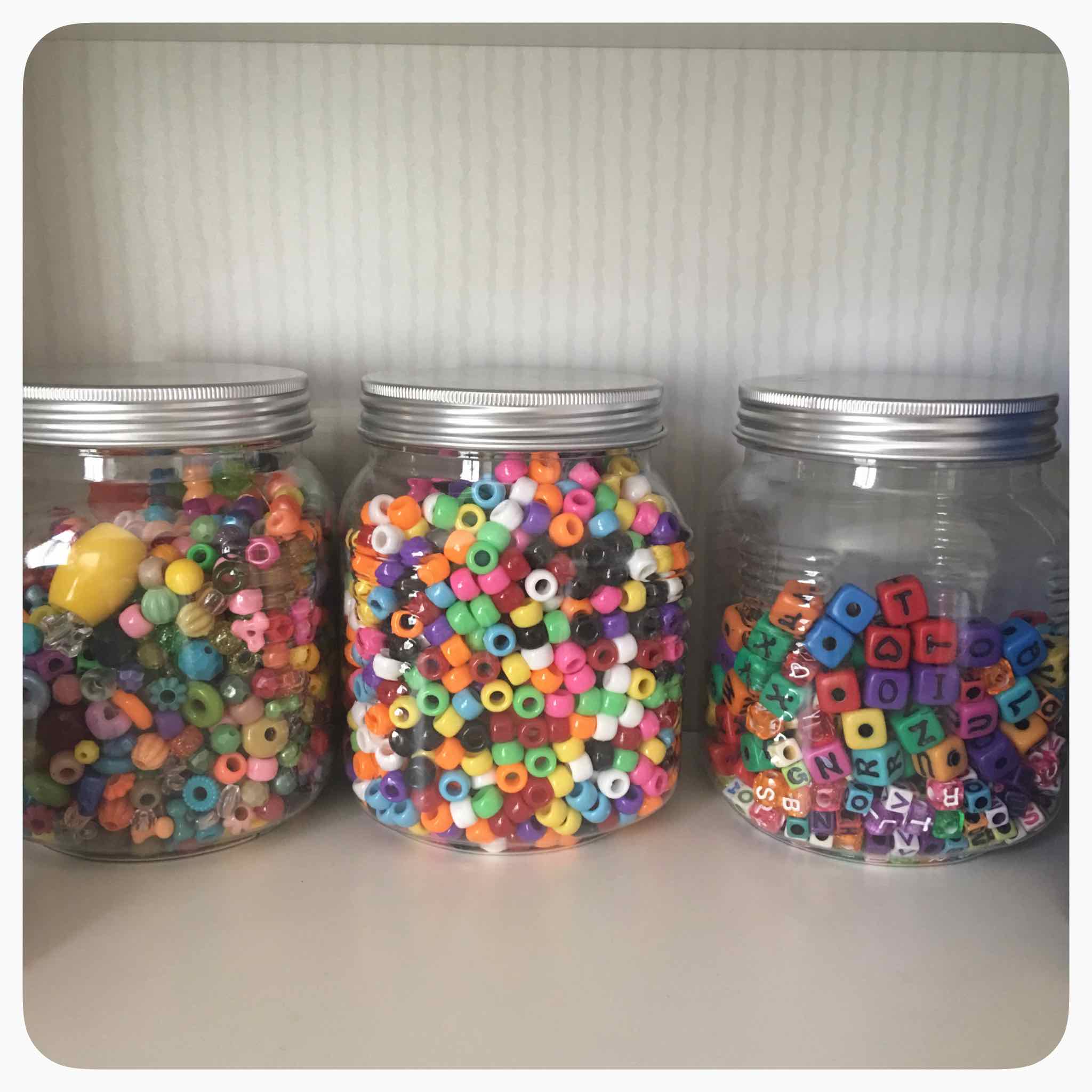 Rainbow Sensory Bottles: water, glitter, beads, hair gel. So simple and yet so much fun! Check out www.how2play.today for more ideas