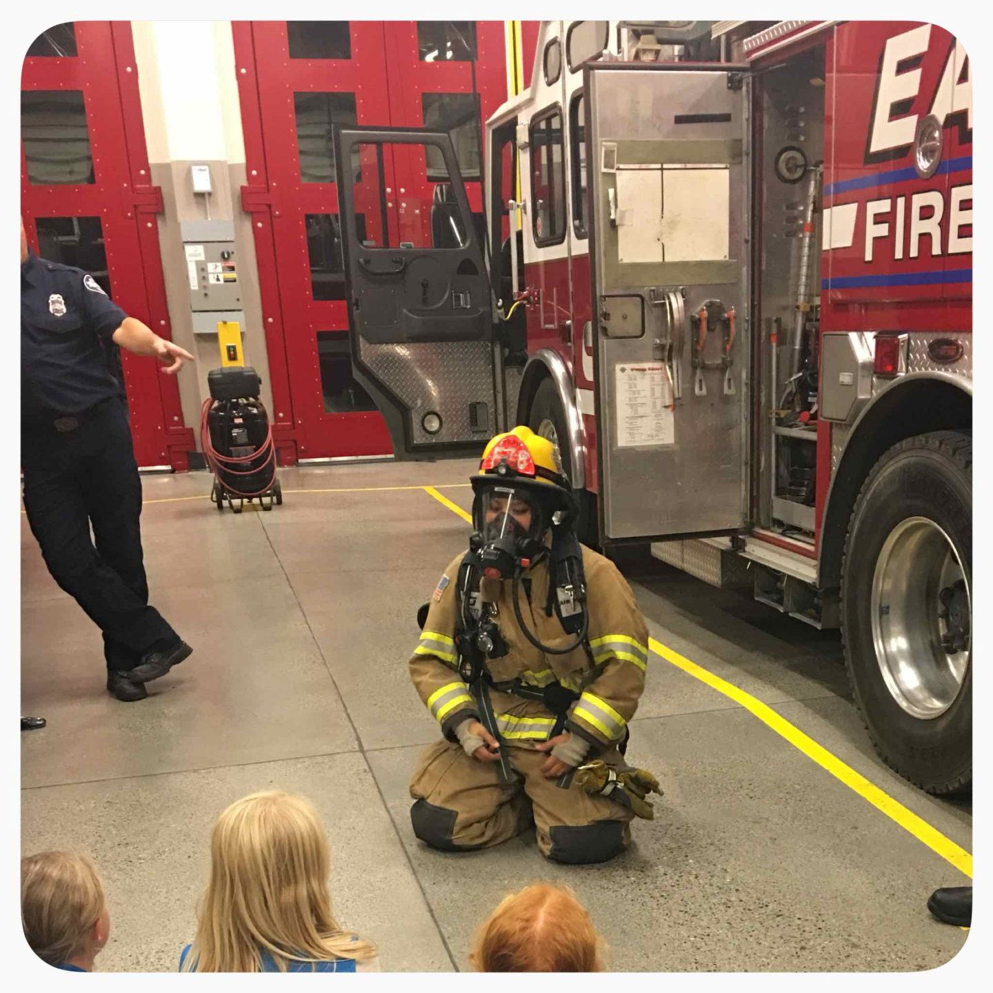 Fire Safety Week: learning about fire fighters and fire safety. Here's a simple DIY box fire truck the children can create to play with.