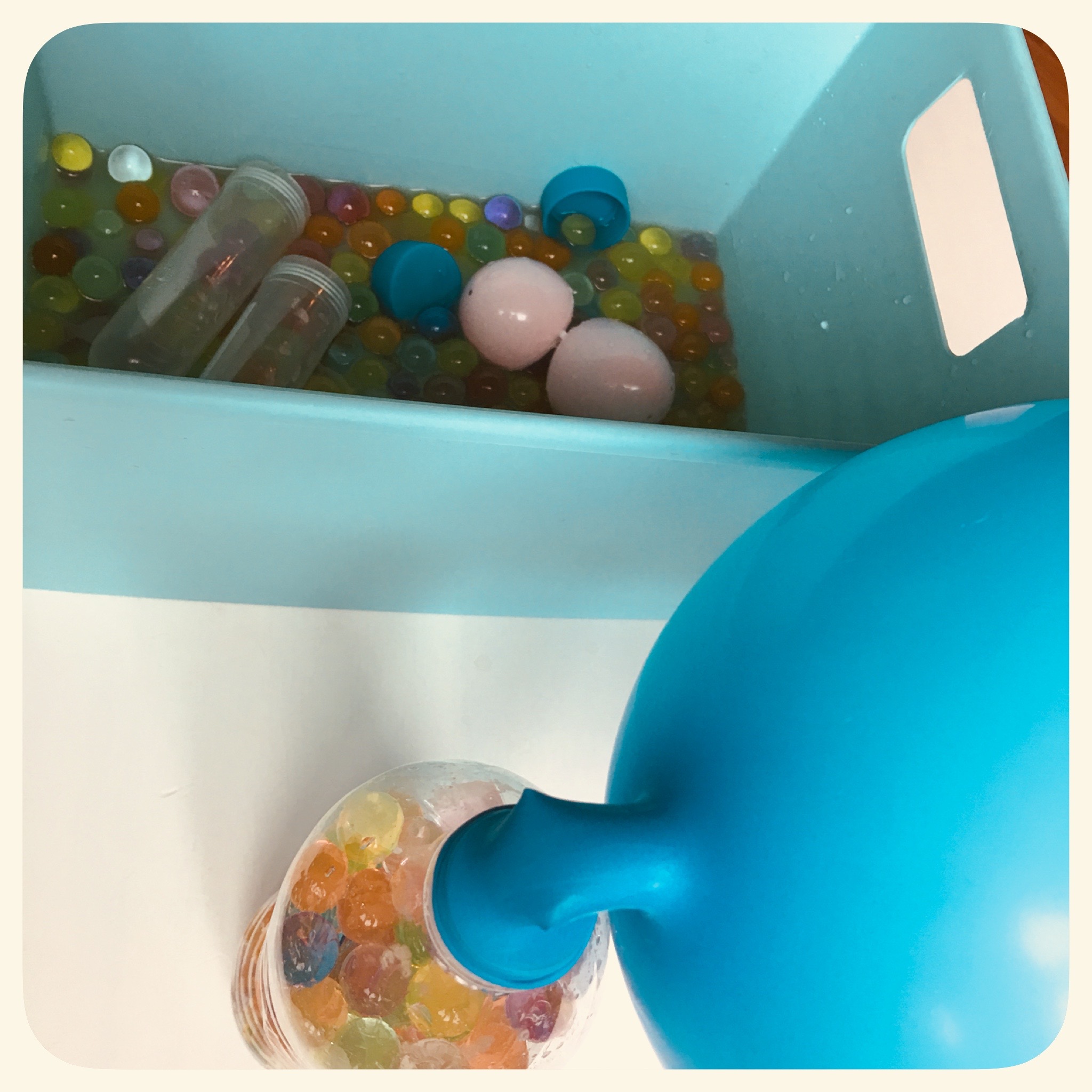 We have had our sensory tub of water beads out for days and wanted to try something new - bring on the balloons! Simple and fun activity your children can do. DIY Stress Ball using water beads / Orbeez