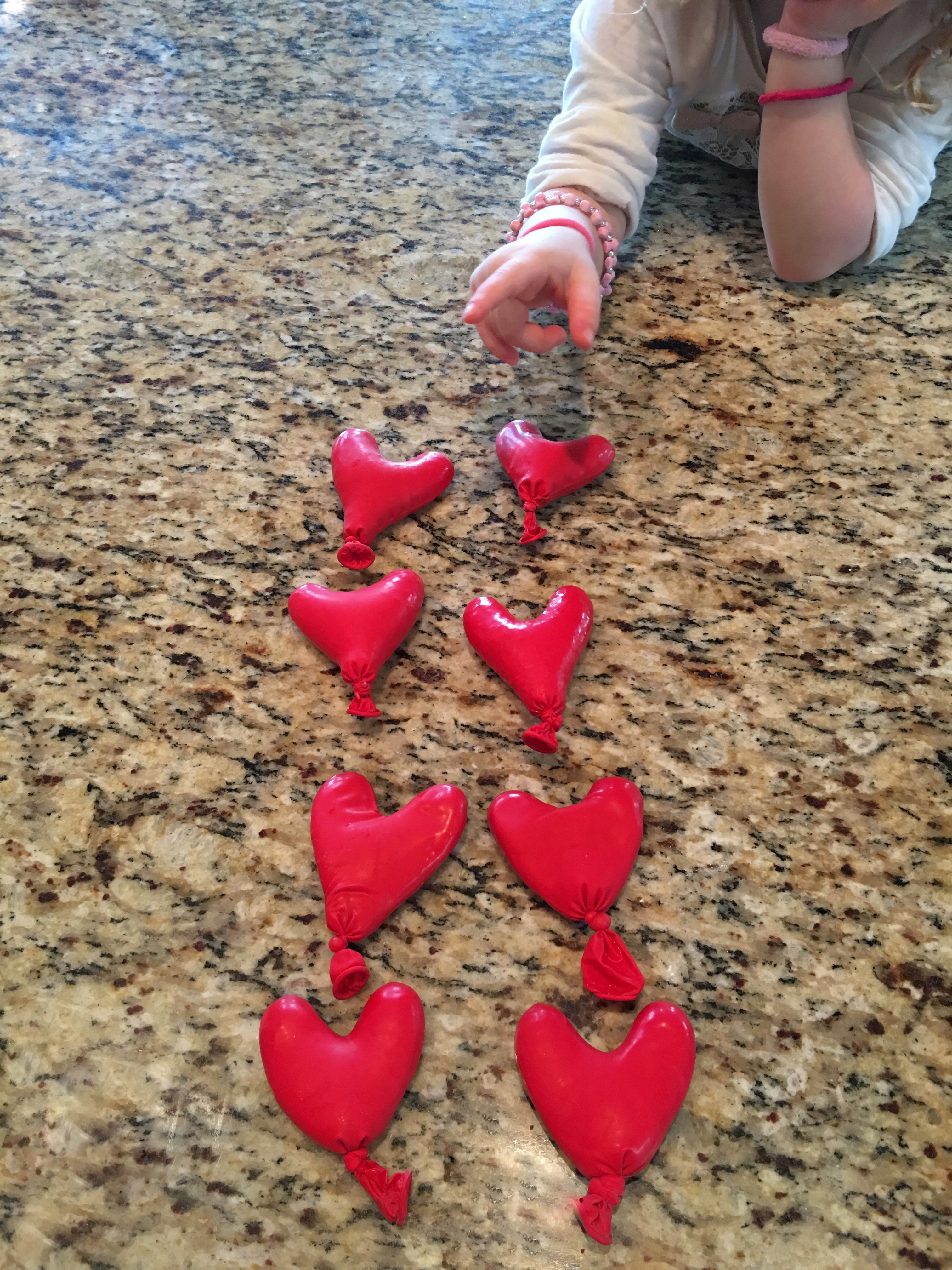 Sensory Hearts made from balloons with simple ingredients you might find already in your kitchen. Makes for a fantastic sensory play activity for your children. These heart balloons are perfect for a simple and fun Valentines Day activity.