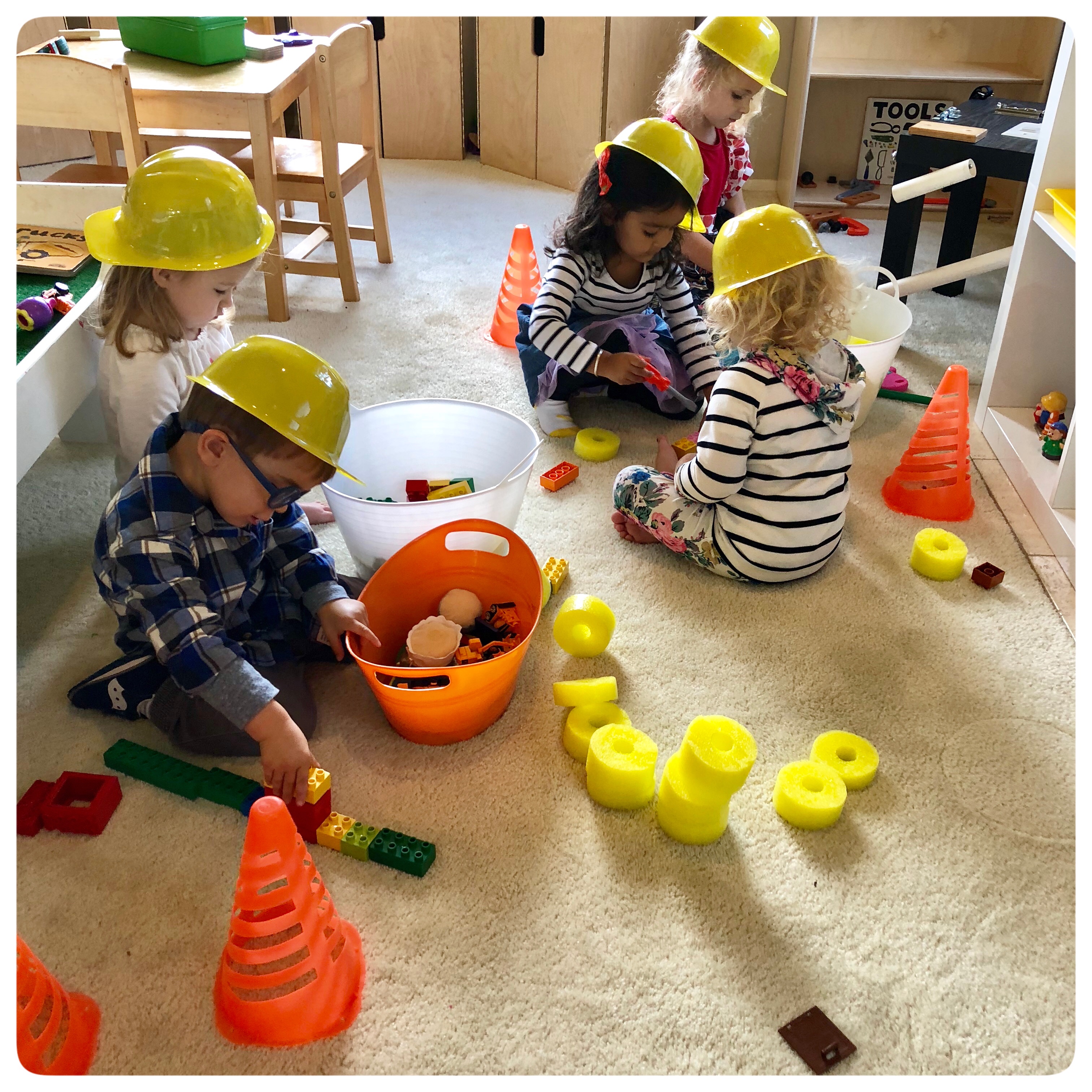Construction Site!  We will be building math, literacy, science, and social skills during our pretend play.
