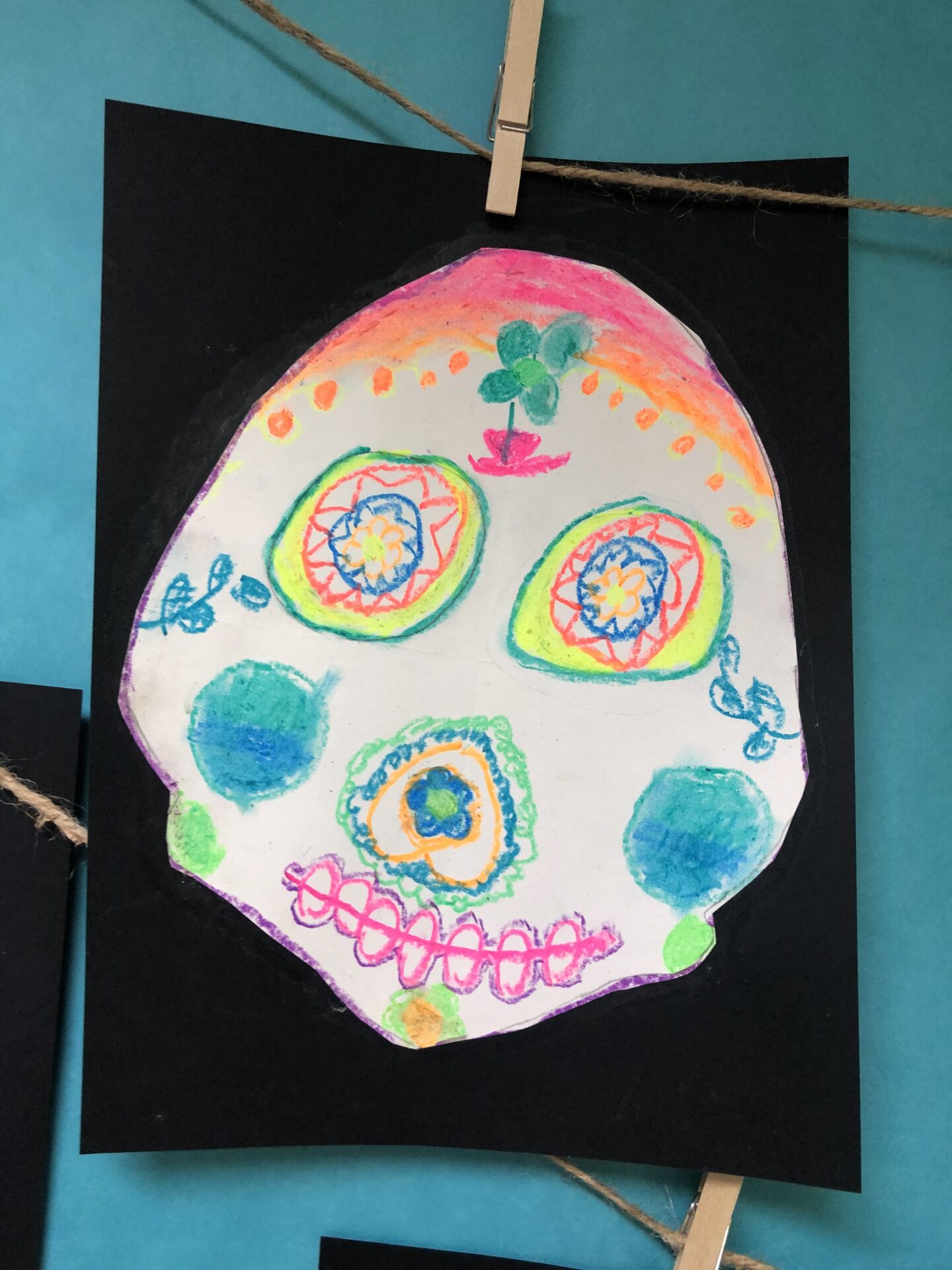 Neon Sugar Skulls - created by students from Grade 3
